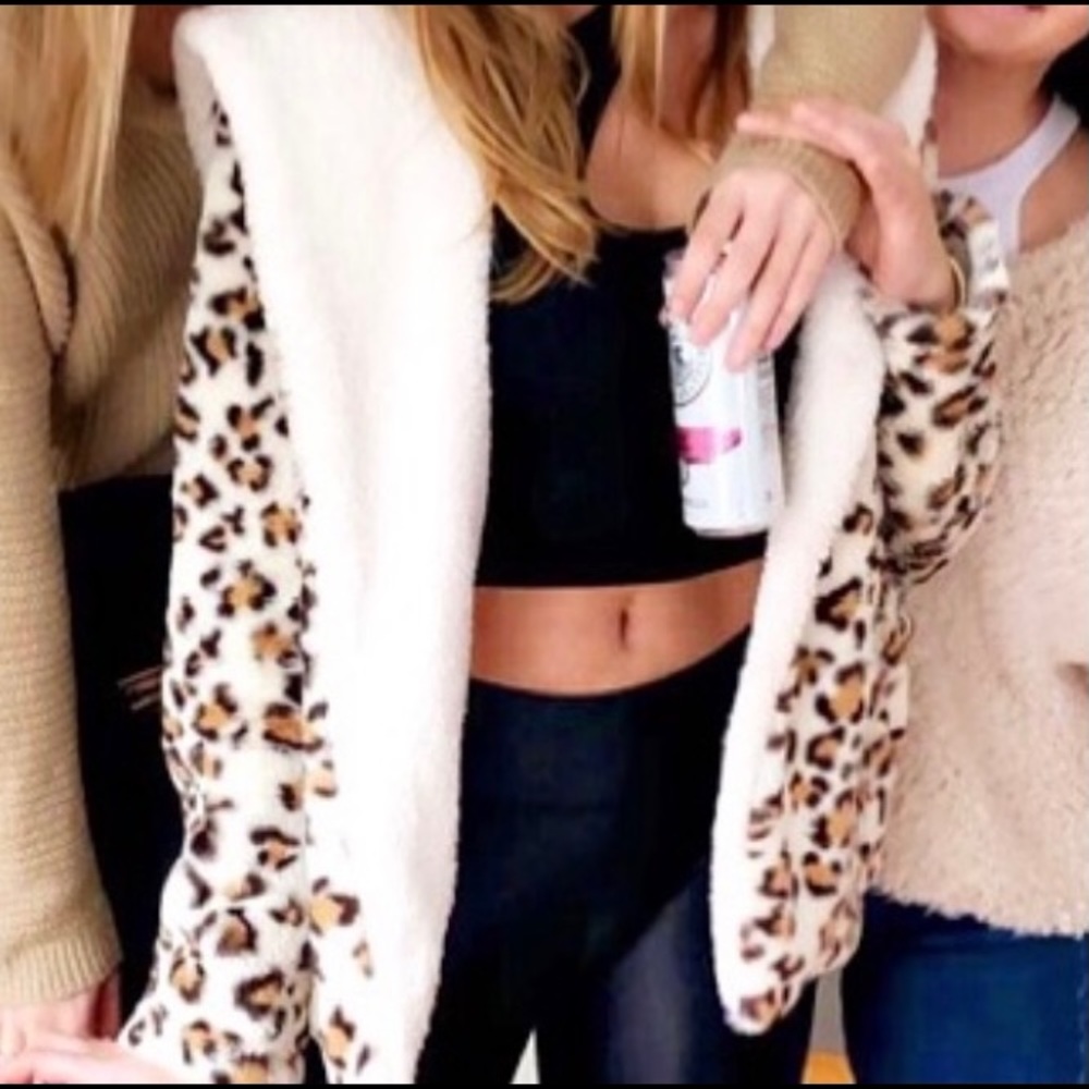 Fuzzy cheetah print hooded sweater